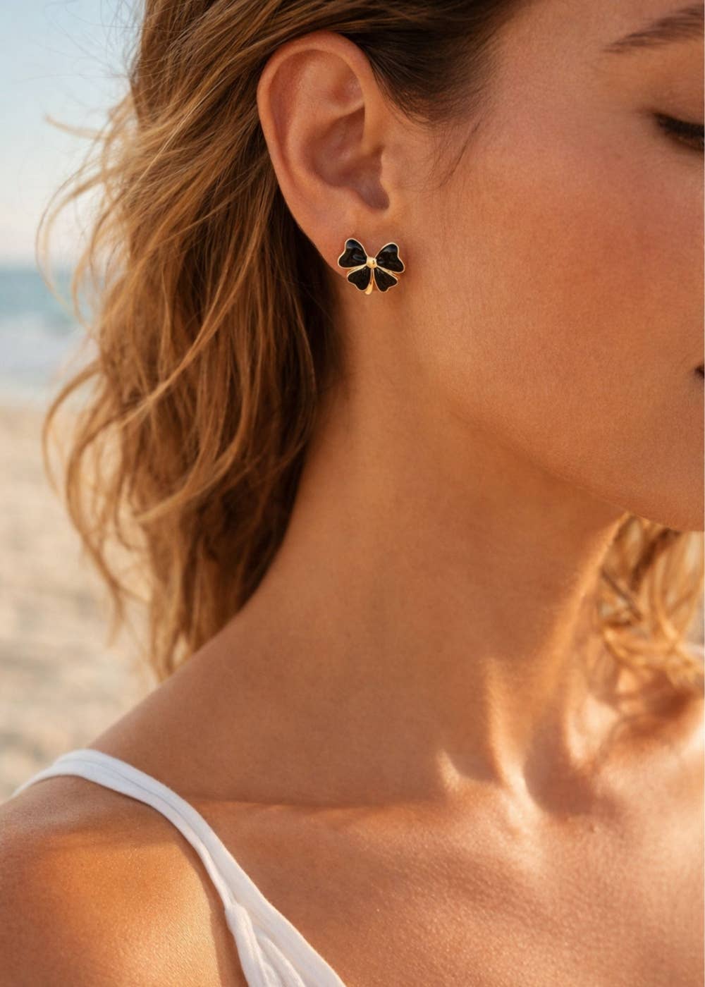 Luxe Black & Gold Bow Stud Earrings