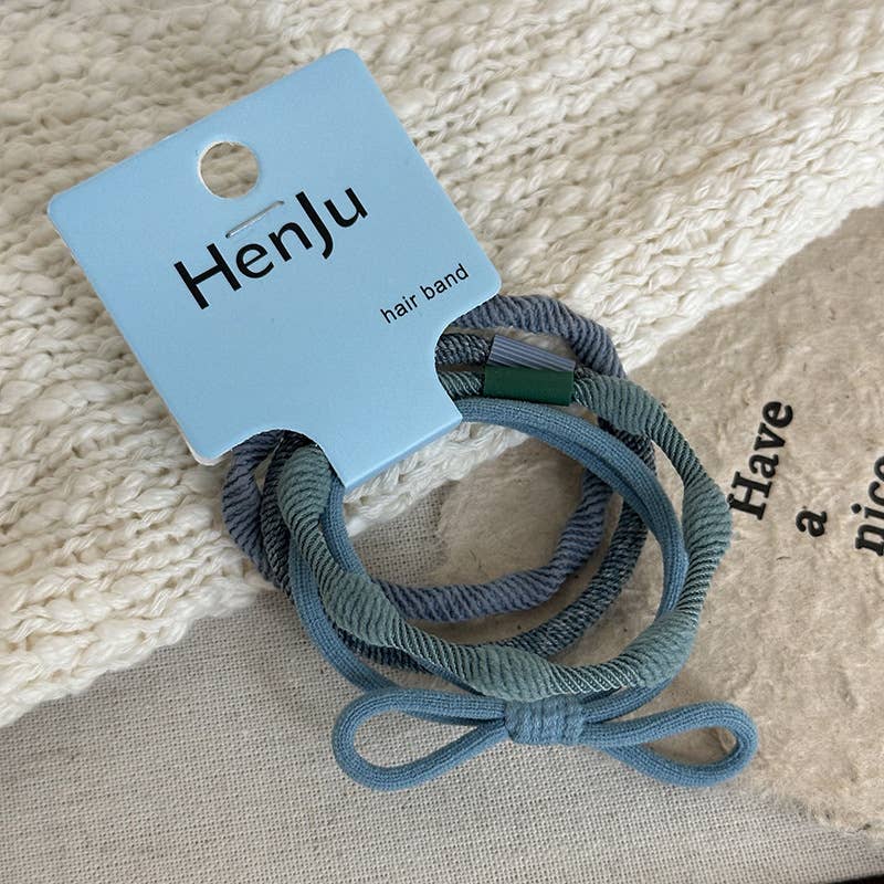 4 PIECES OF CANDY-COLORED SIMPLE HAIR TIES_CWAHA1130