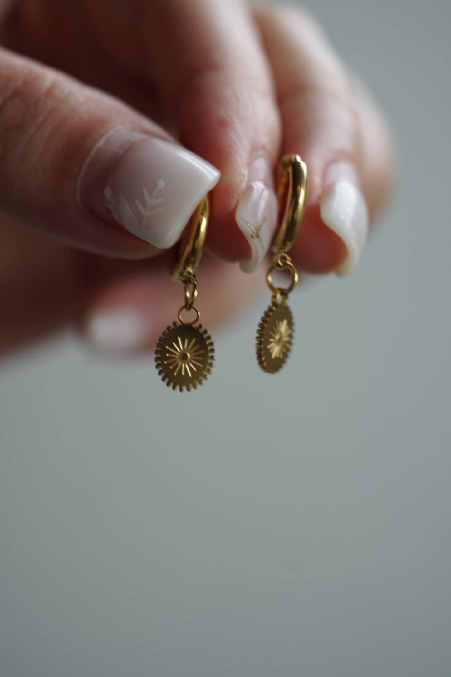 Sunburst charm Gold Huggie hoops